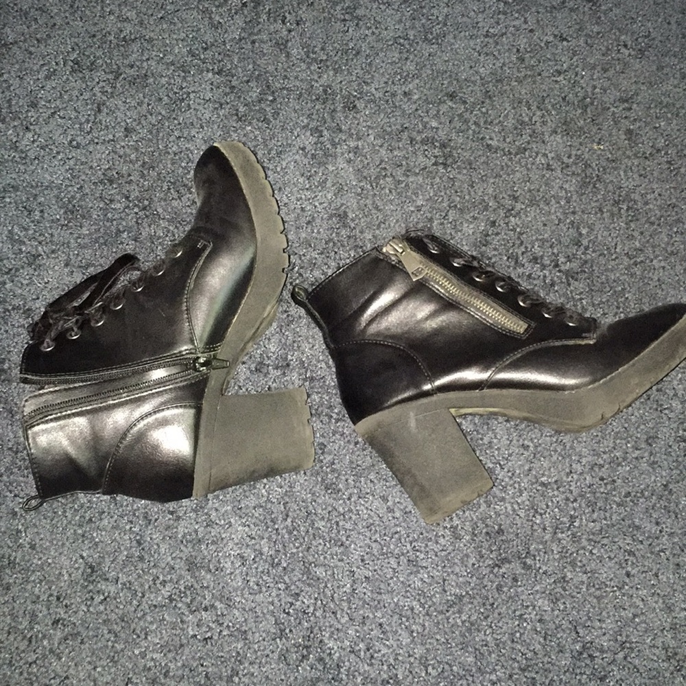high heeled black ankle boots